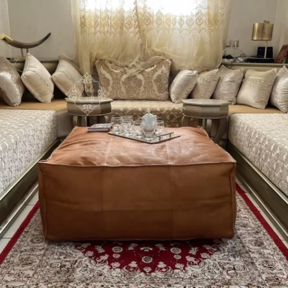 https://shophaus.co.uk/product/handmade-furniture-cowhide-leather-ottomantable-unstuffed/